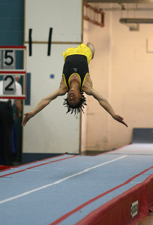 Gymnast performing tumbling pass